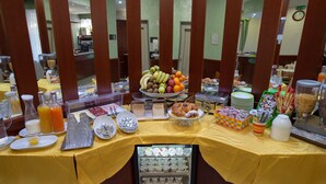 A breakfast buffet with various food items and beverages. - HD Hotel (Milan)