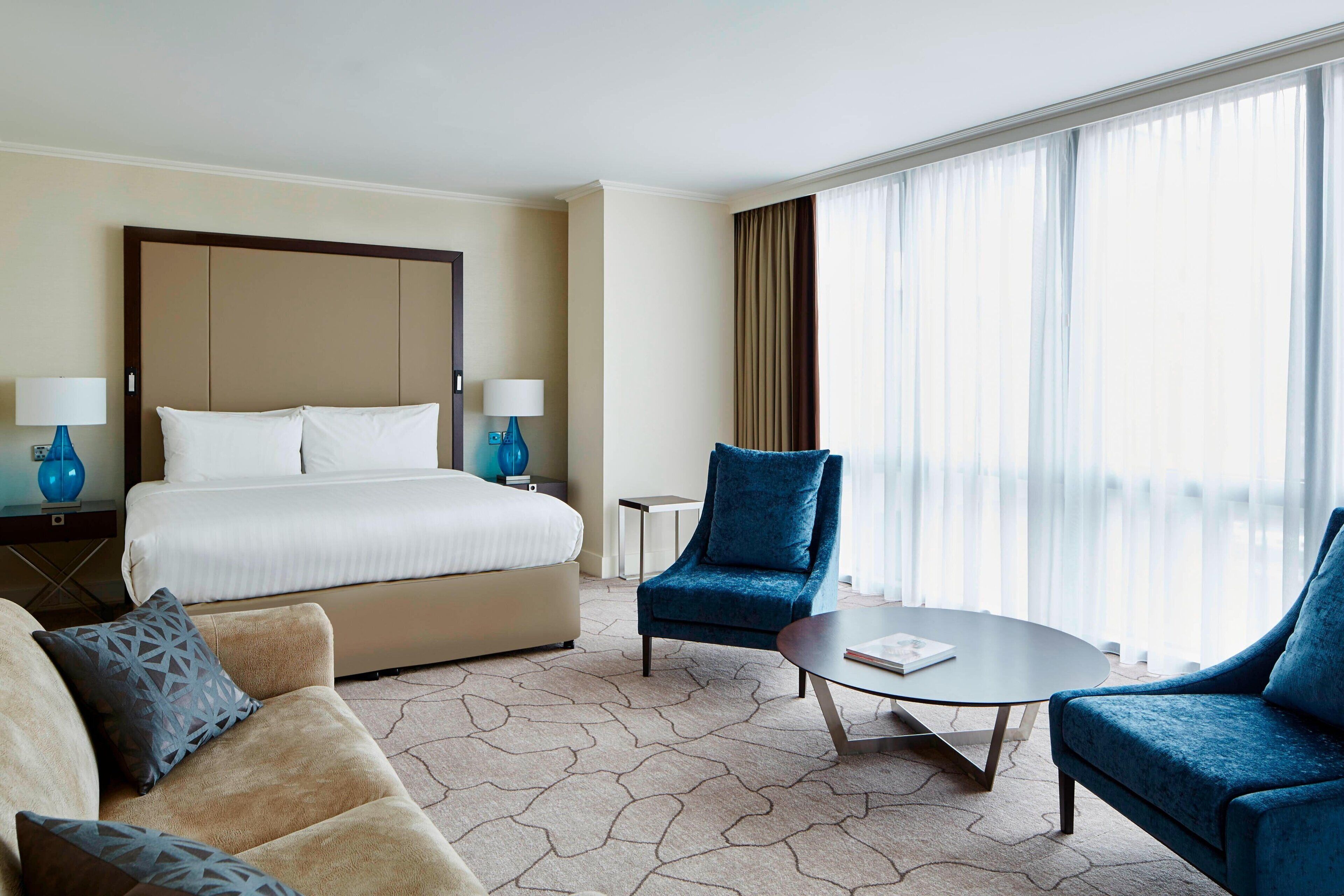 executive studio suite, 1 king bed | 1 bedroom, premium bedding, down duvets, pillow-top beds