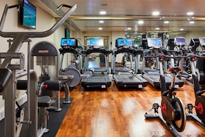 Stay fit on the go with our fully equipped gym featuring treadmills, elliptical trainers, and weight machines.