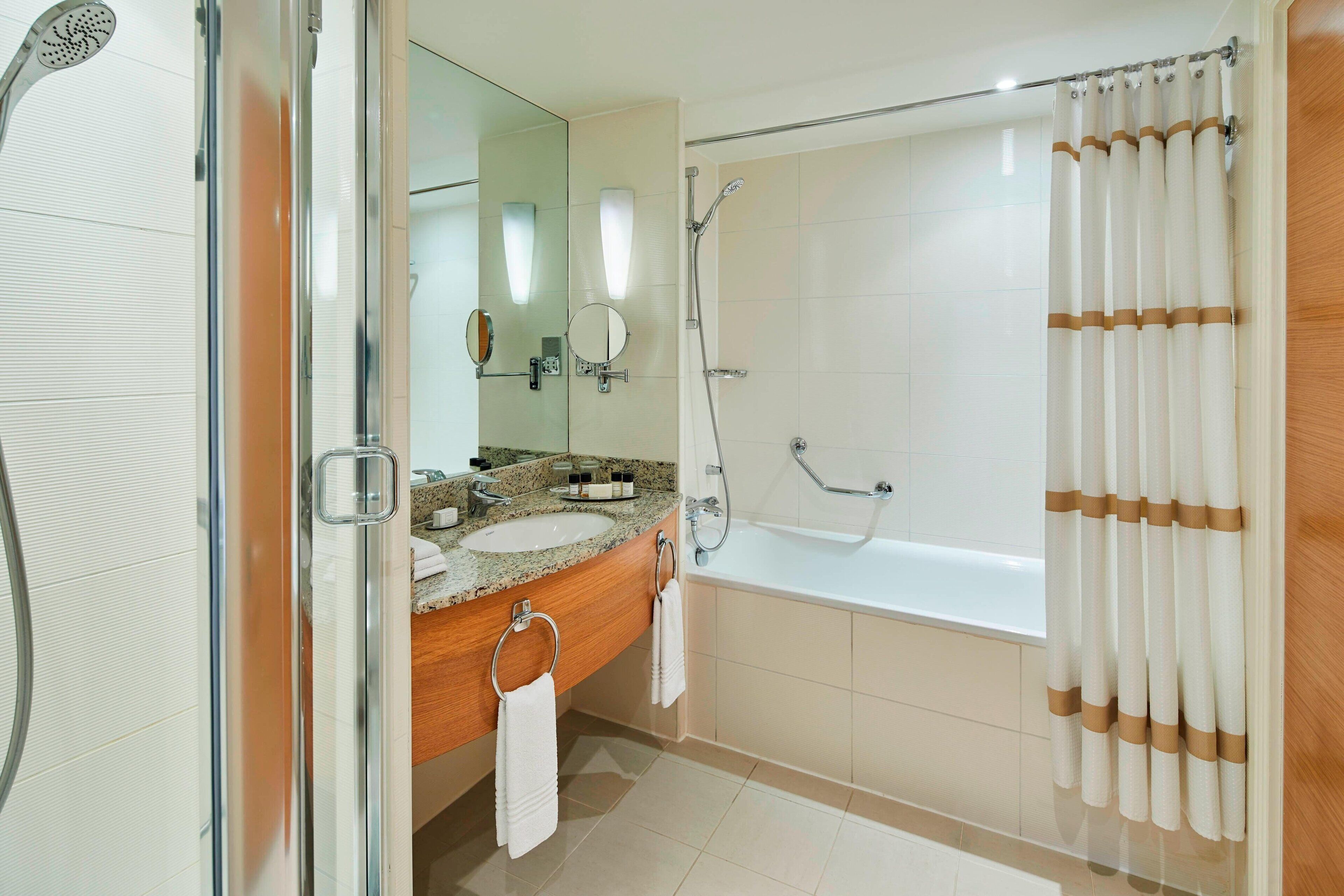 executive suite, 1 bedroom | bathroom | combined shower/bathtub, deep-soaking bathtub, free toiletries