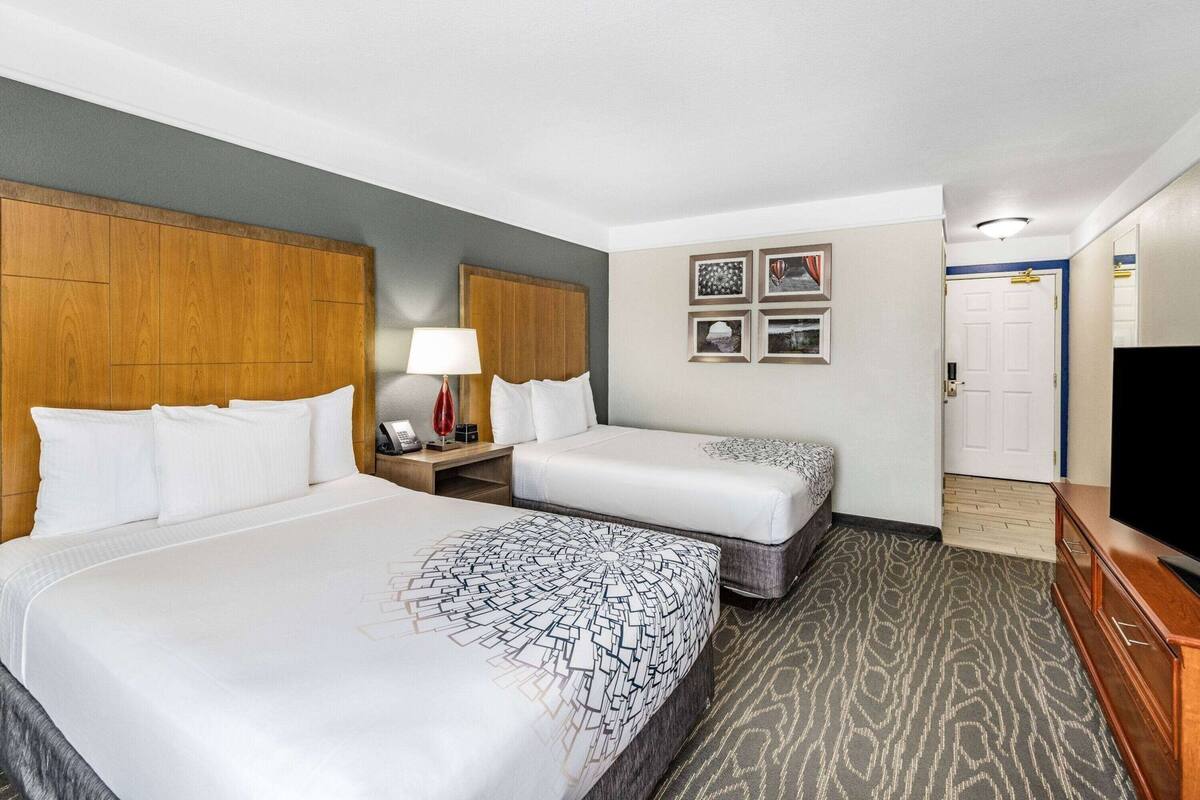 Premium bedding, pillowtop beds, desk, laptop workspace
