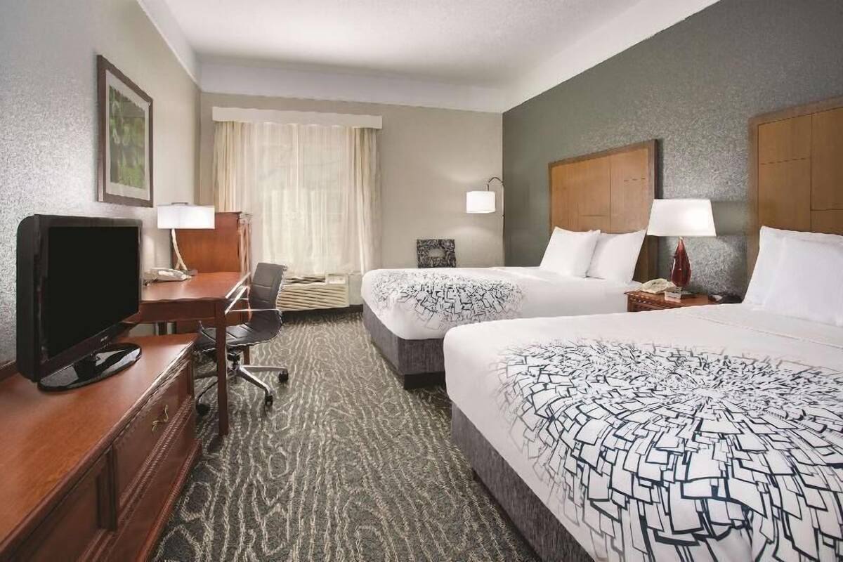 Premium bedding, pillowtop beds, desk, laptop workspace