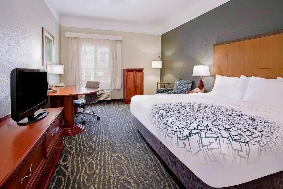 Premium bedding, pillowtop beds, desk, laptop workspace