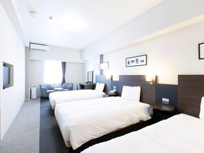 Family Room, 3 Twin Beds, Non Smoking | In-room safe, desk, blackout drapes, iron/ironing board