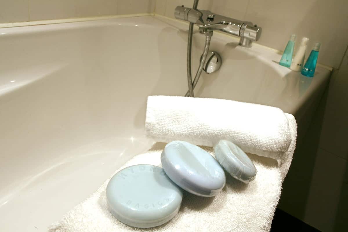 deep-soaking bathtub, free toiletries, hair dryer, towels