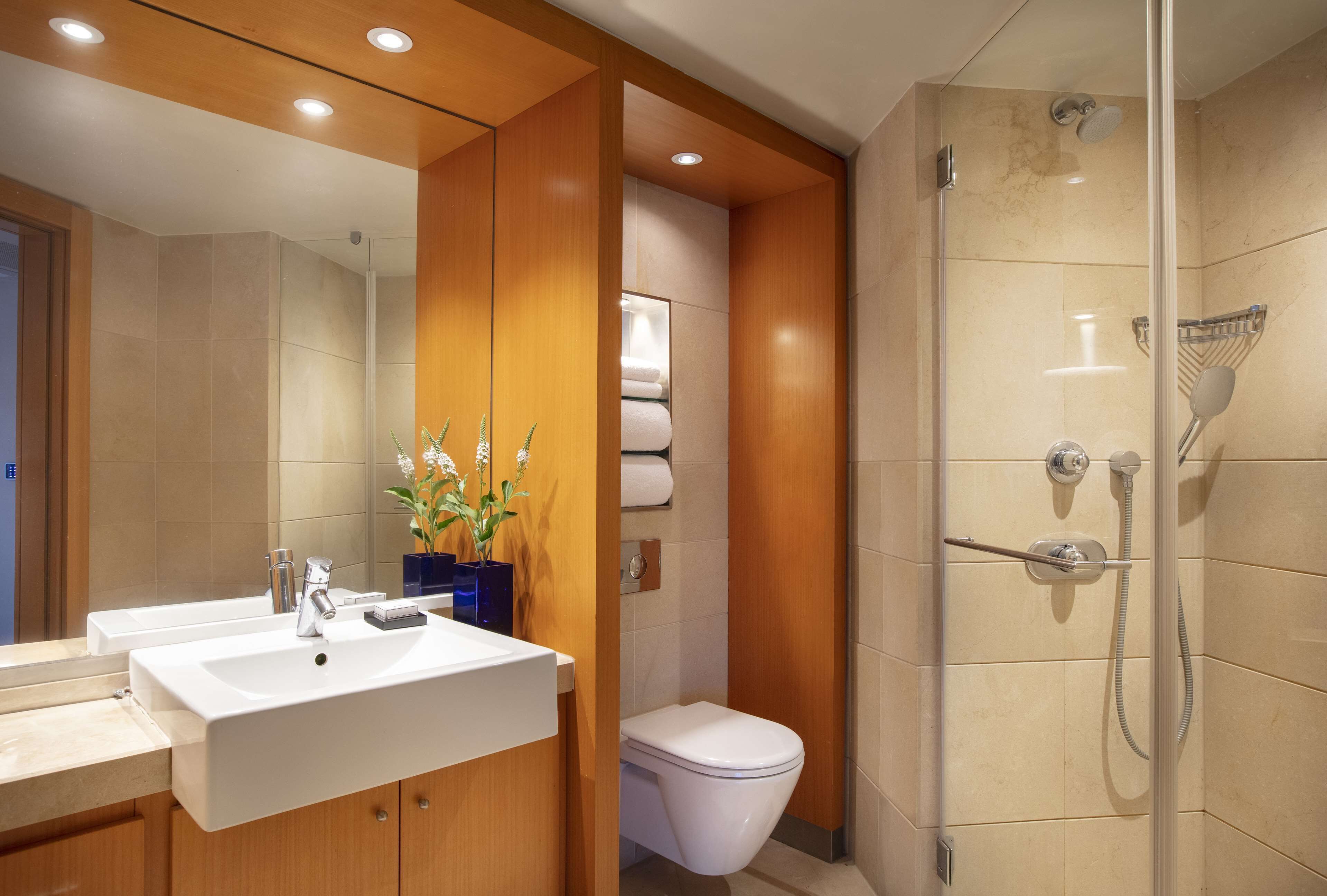 suite, 1 bedroom, balcony, river view | bathroom | combined shower/bathtub, eco-friendly toiletries, hair dryer, towels