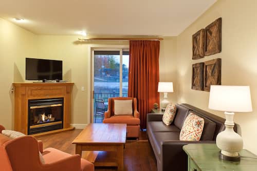 32-inch TV with cable channels, fireplace, DVD player