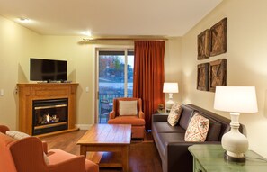 32-inch TV with cable channels, fireplace, DVD player