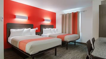 Desk, laptop workspace, blackout drapes, iron/ironing board