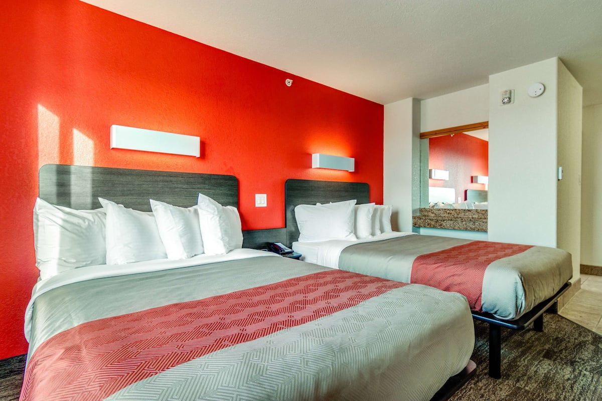 Desk, laptop workspace, blackout curtains, iron/ironing board