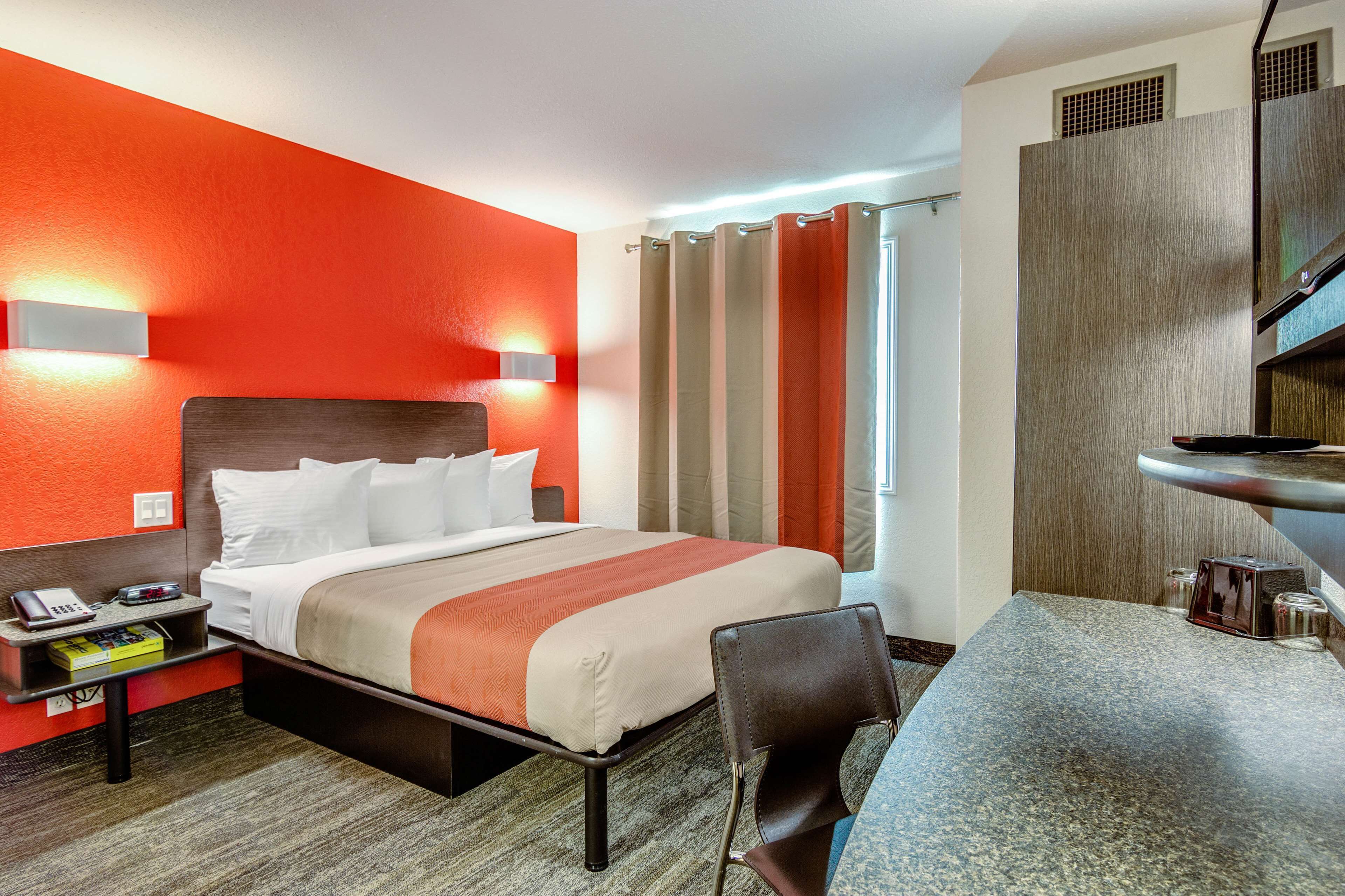 Desk, laptop workspace, blackout curtains, iron/ironing board