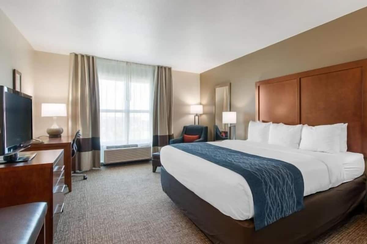 Down comforters, desk, iron/ironing board, free cribs/infant beds