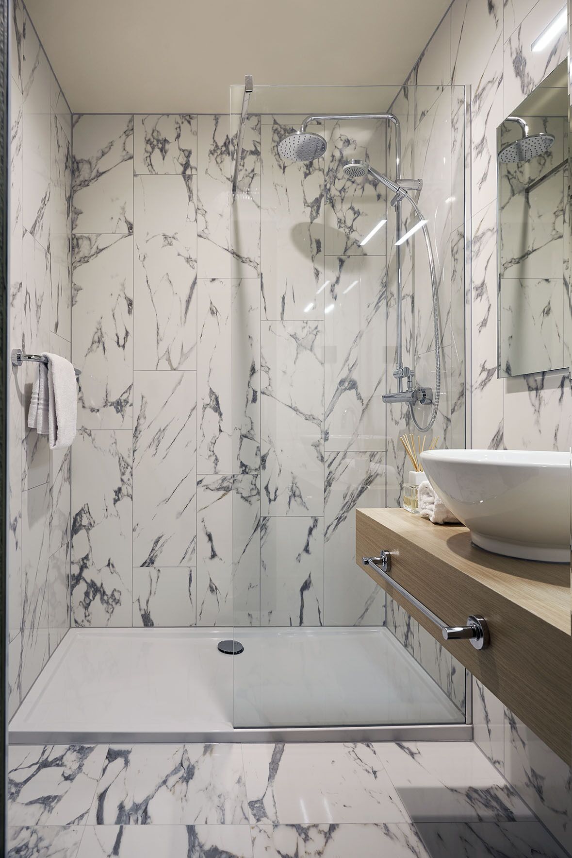 superior double room | bathroom | rainfall showerhead, free toiletries, hair dryer, towels