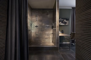 Suite, Sauna | Bathroom | Rainfall showerhead, free toiletries, hair dryer, towels