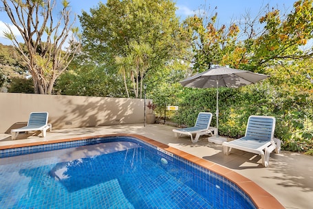Outdoor pool, open 8:00 AM to 9:00 PM, pool umbrellas, sun loungers