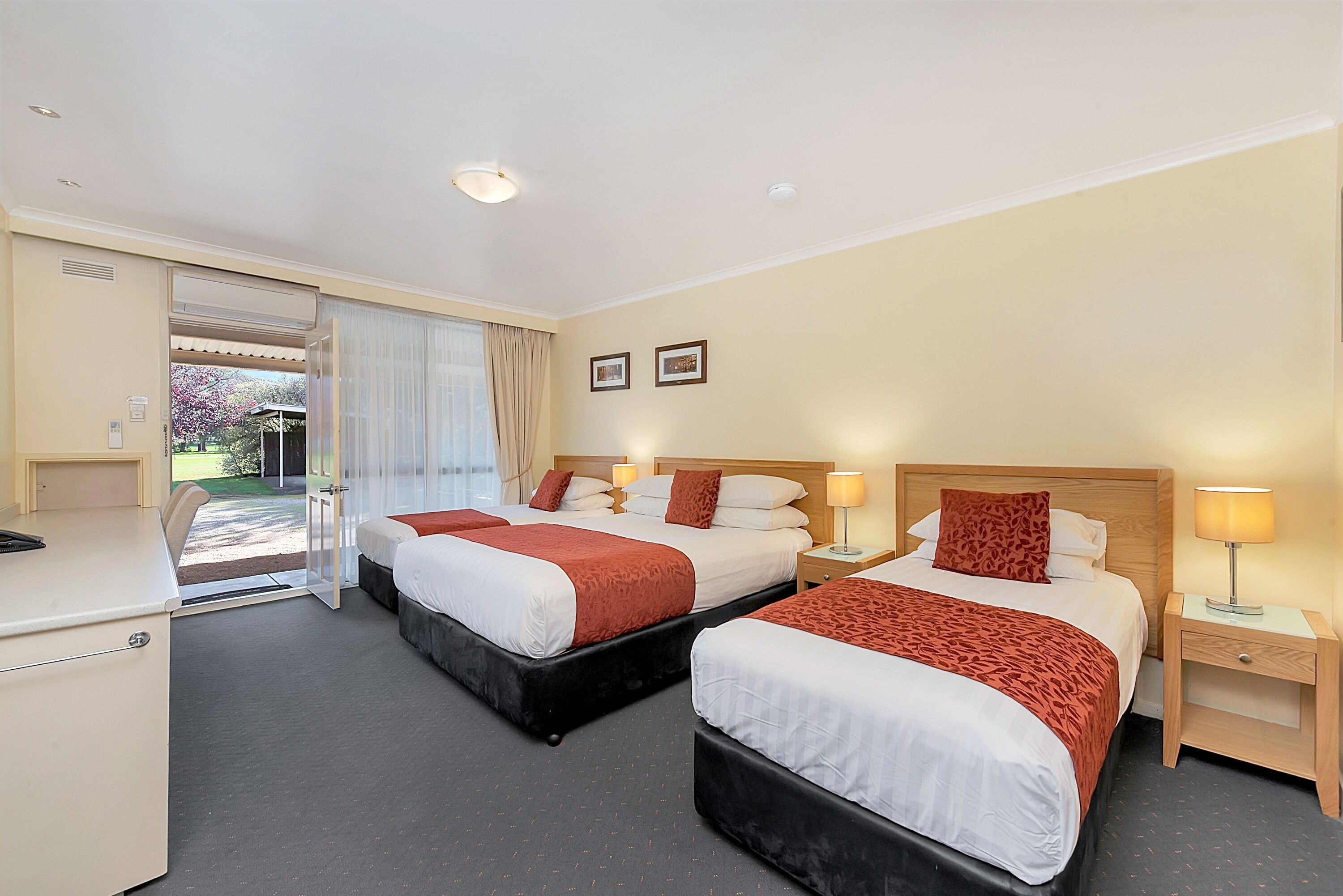 Premium bedding, pillowtop beds, desk, laptop workspace
