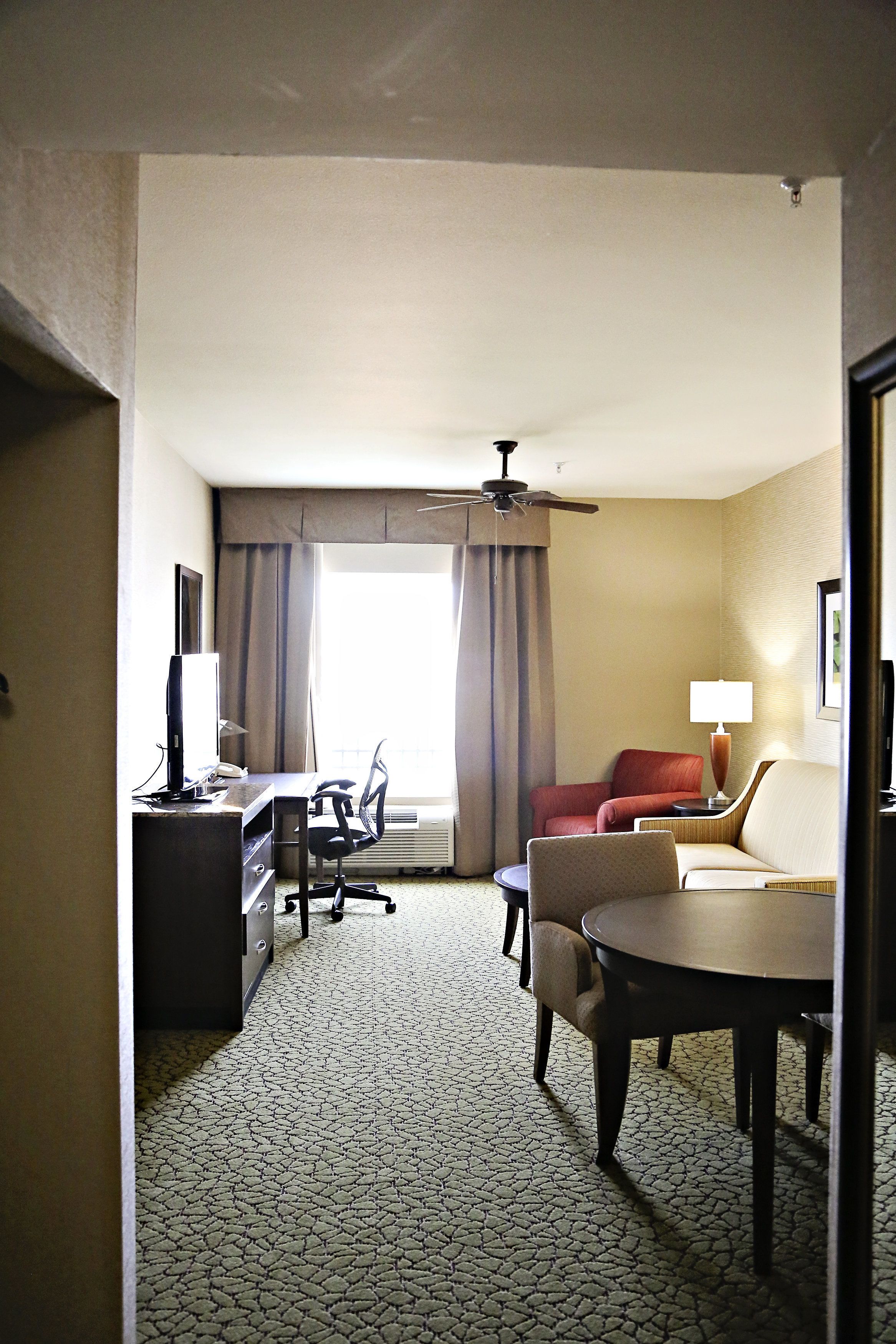 king bedroom whirlpool suite | in-room safe, desk, blackout curtains, iron/ironing board