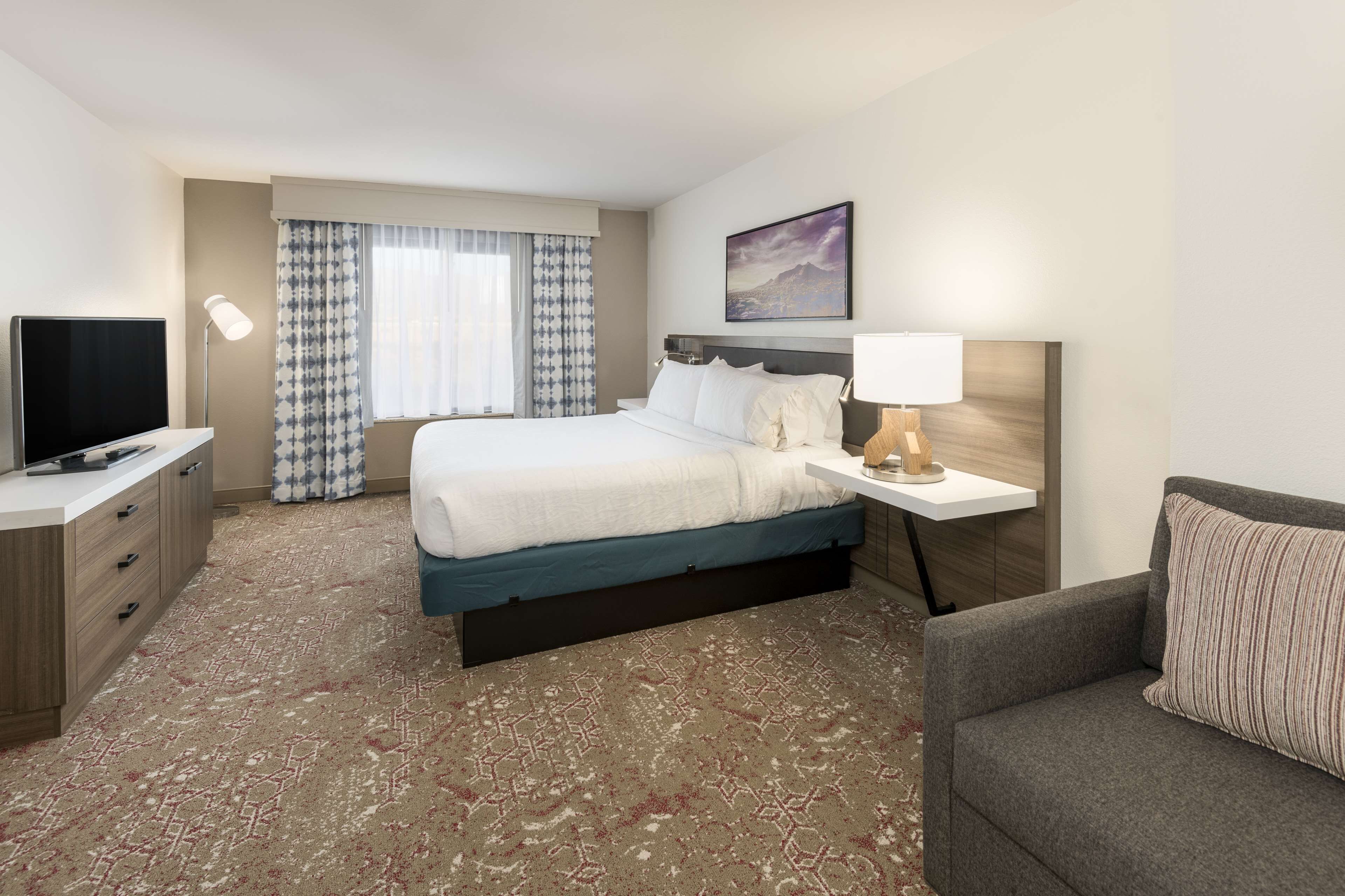 hypo-allergenic bedding, desk, blackout curtains, iron/ironing board