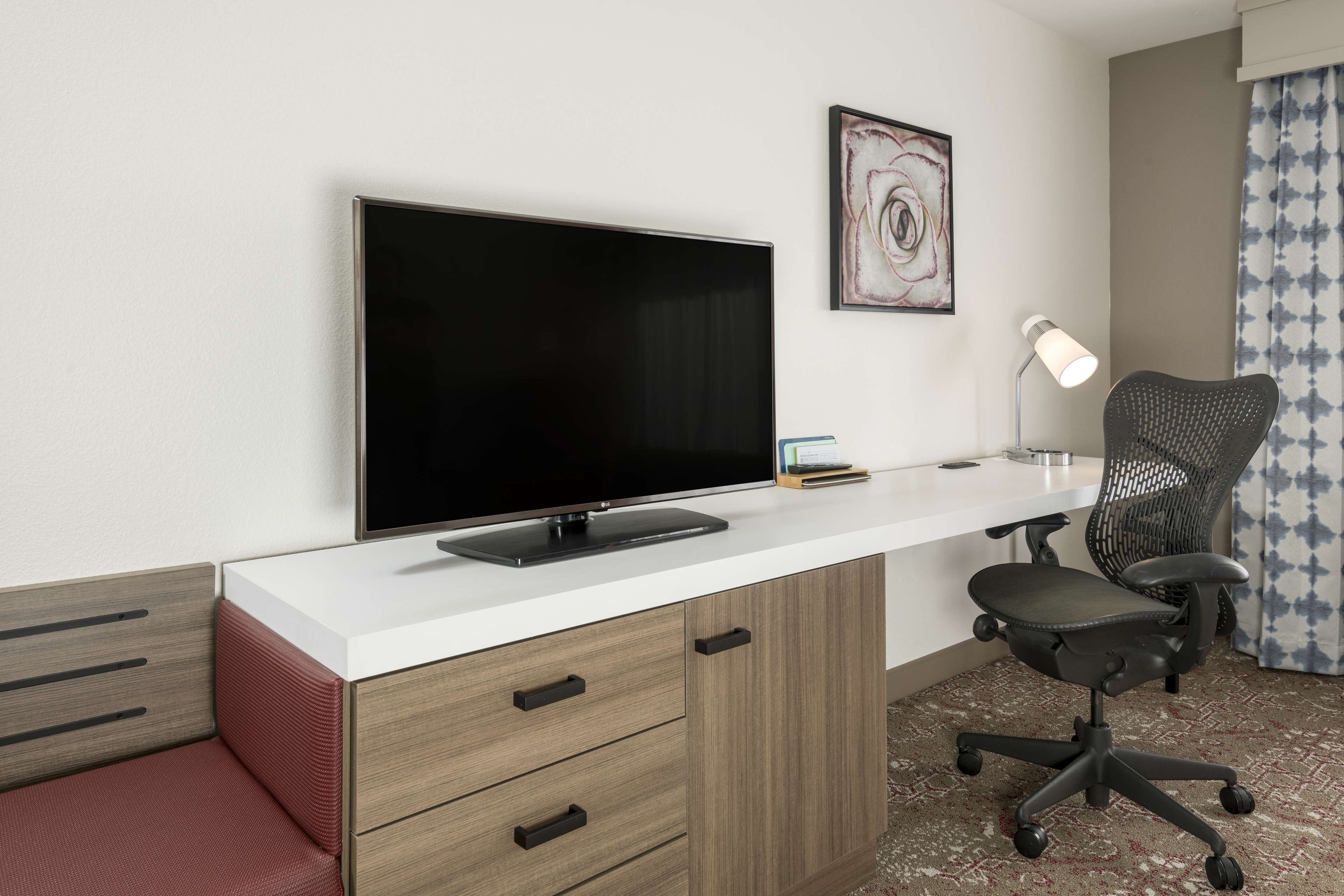 hypo-allergenic bedding, desk, blackout curtains, iron/ironing board