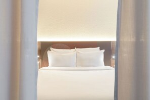 高级套房 | 1 多间卧室、高档床上用品、迷你吧、客房内保险箱