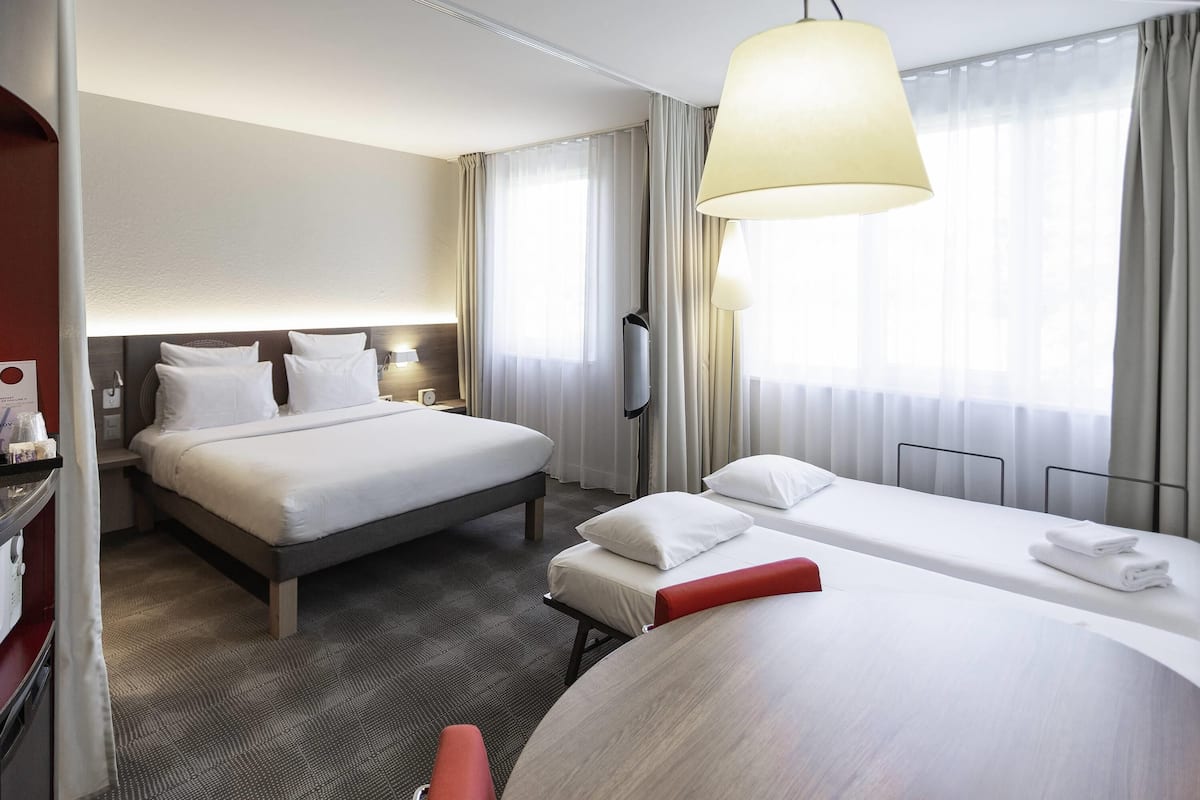 family suite | 1 bedroom, premium bedding, minibar, in-room safe