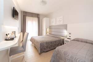 Triple Room | Down comforters, minibar, blackout drapes, free cribs/infant beds