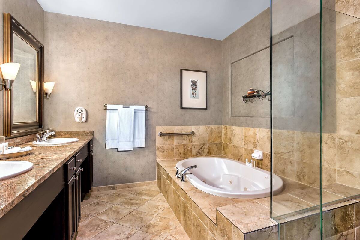 executive room, 1 king bed, non smoking (multi-level) | bathroom | free toiletries, hair dryer, towels, soap