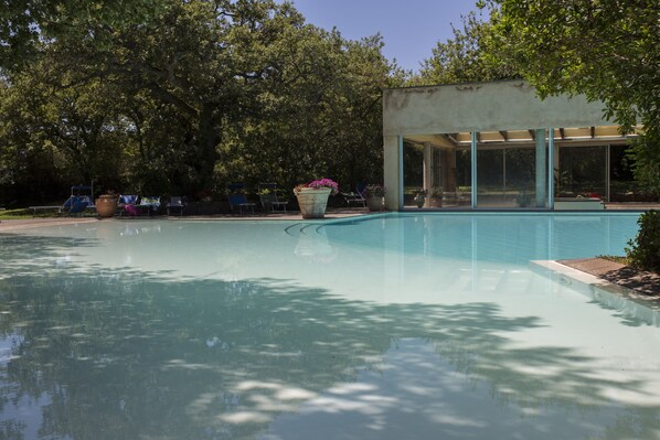 Outdoor pool, a waterfall pool, open open 24 hours a day, pool loungers