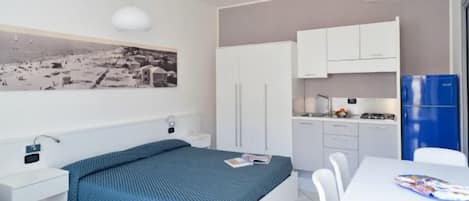 Appartement, 1 slaapkamer (3 Adults) | Een kluis op de kamer, een bureau, gratis babybedden, extra bedden