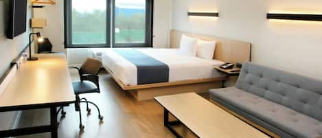 Svit - 1 queensize-sÀng med bÀddsoffa | Skrivbord, mörklÀggningsgardiner, gratis wi-fi och sÀngklÀder