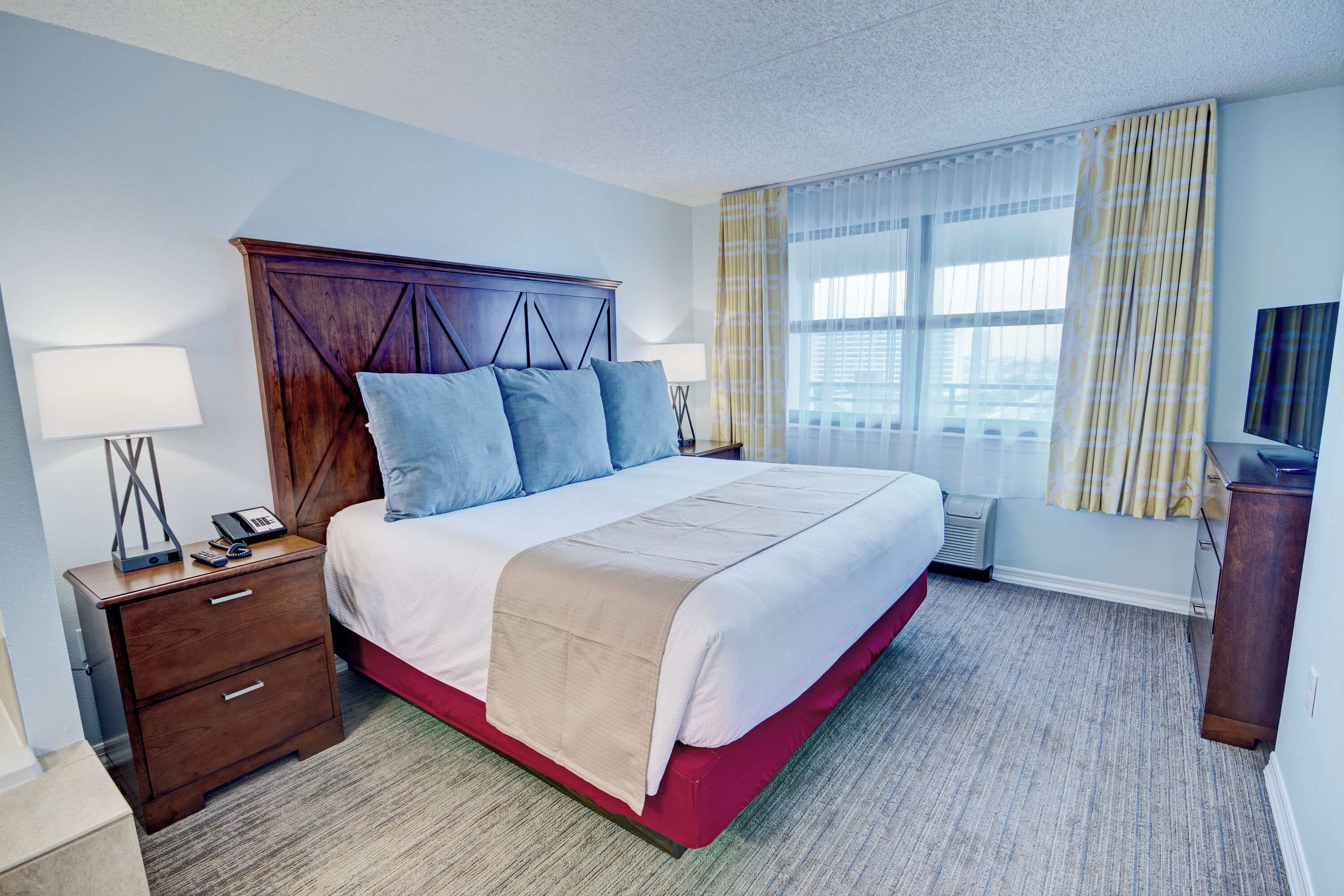 deluxe condo, 2 bedrooms, balcony | 1 bedroom, in-room safe, desk, blackout curtains