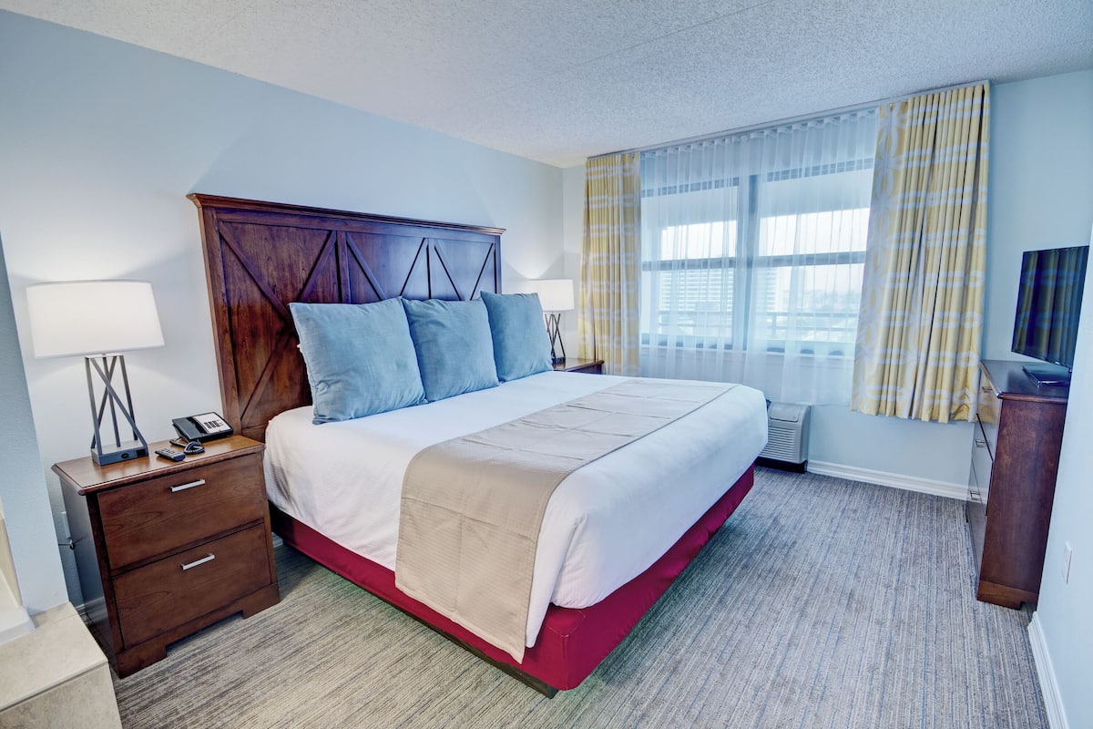 deluxe condo, 2 bedrooms, balcony | 1 bedroom, in-room safe, desk, blackout curtains