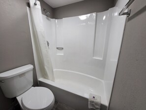 Combined shower/tub, hair dryer, towels, soap