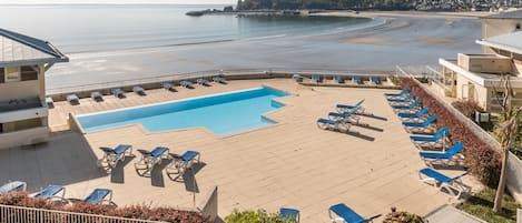 Seasonal outdoor pool, pool umbrellas, pool loungers