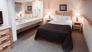 Loft Fireplace Suite - Water Park Included | In-room safe, iron/ironing board, Internet, bed sheets