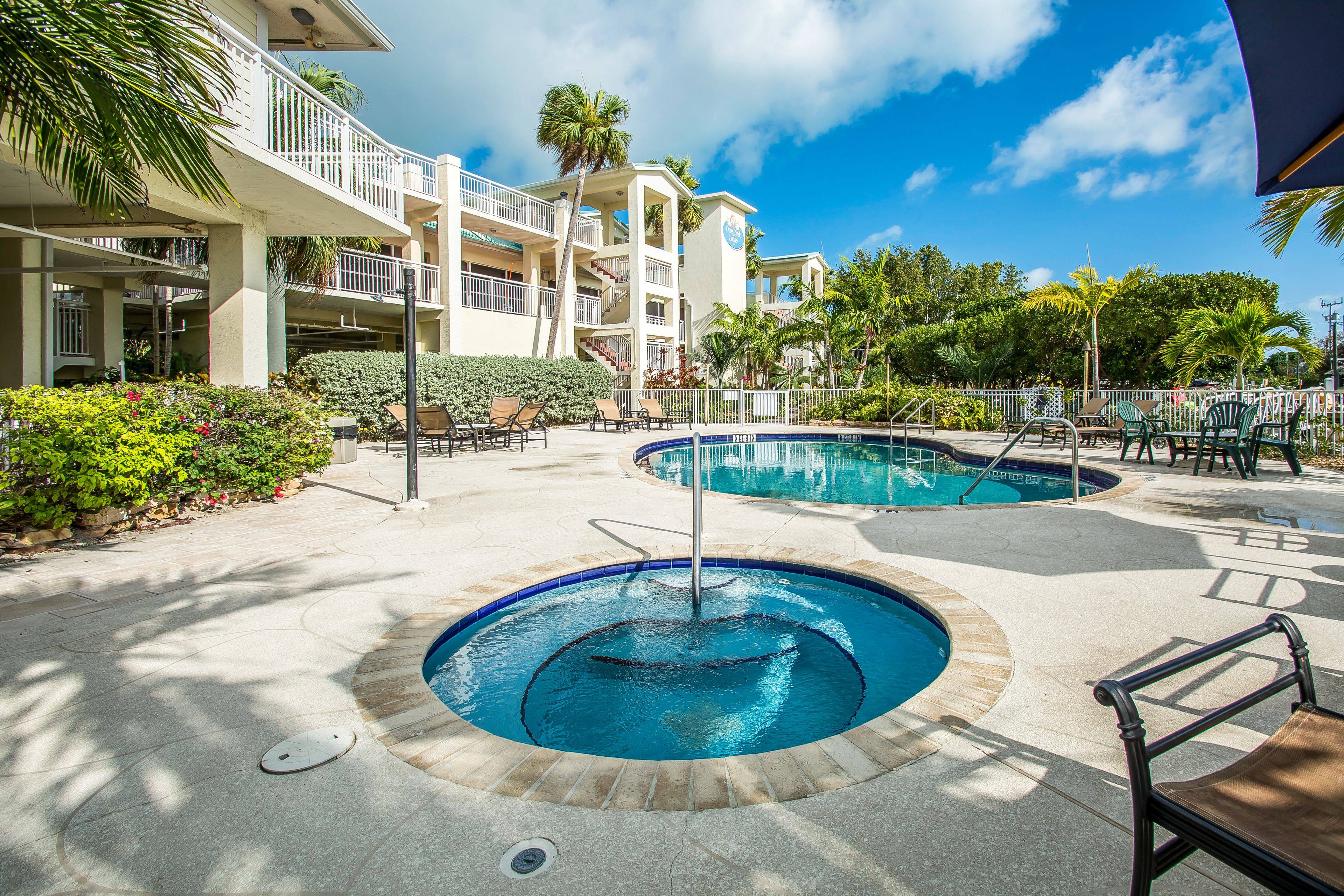 Outdoor pool, open 7 AM to 8 PM, pool umbrellas, sun loungers