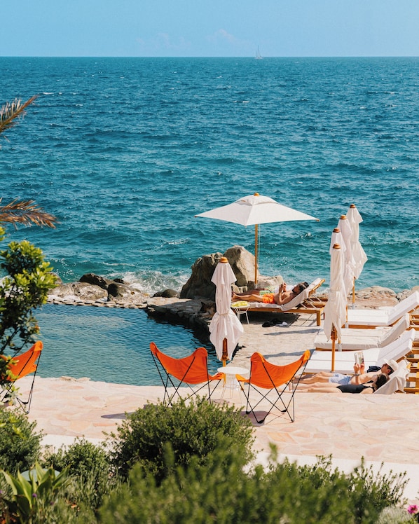 2 outdoor pools, pool umbrellas, sun loungers