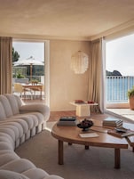 Suite (Riviera) | Minibar, in-room safe, individually decorated, individually furnished