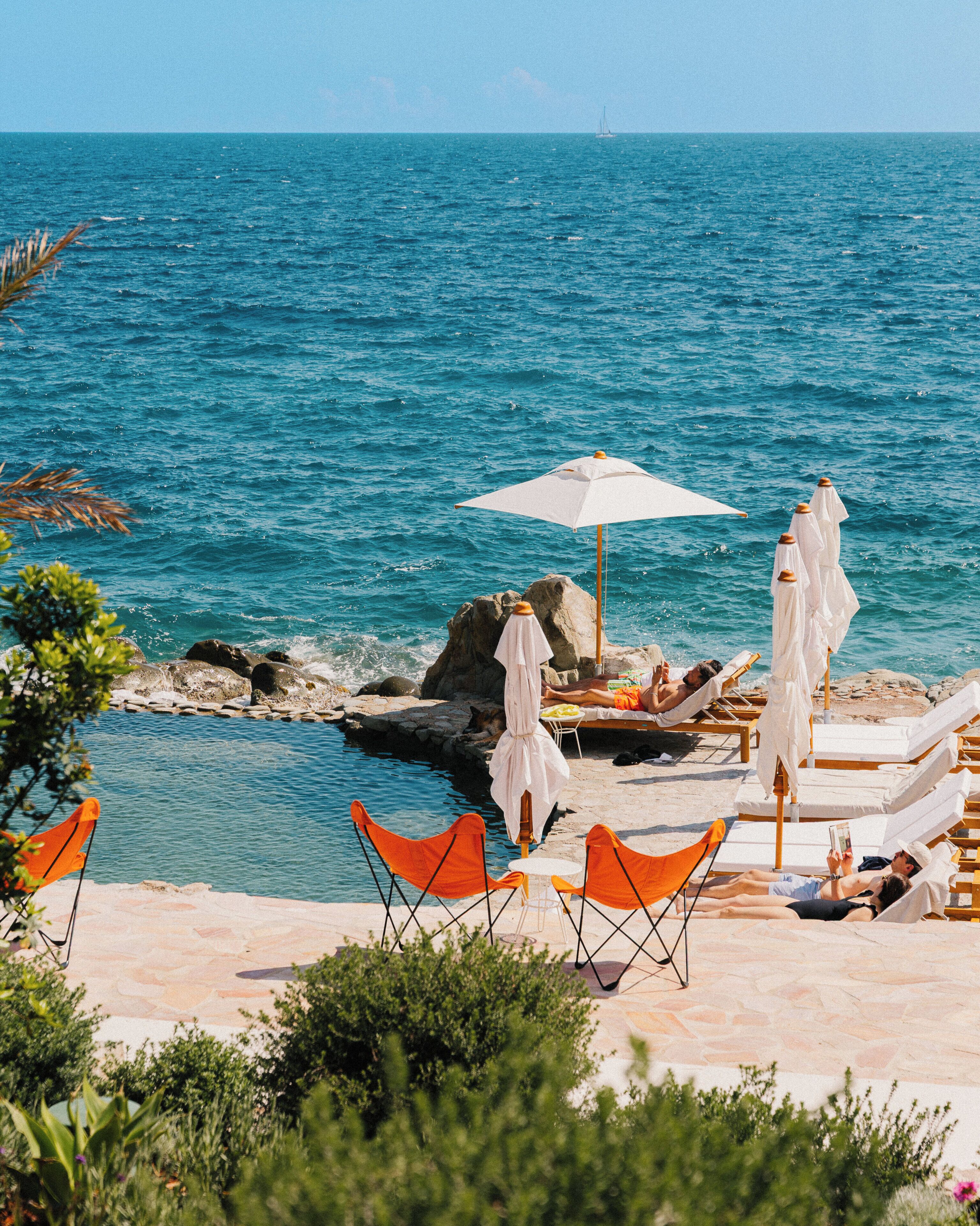 2 outdoor pools, pool umbrellas, pool loungers