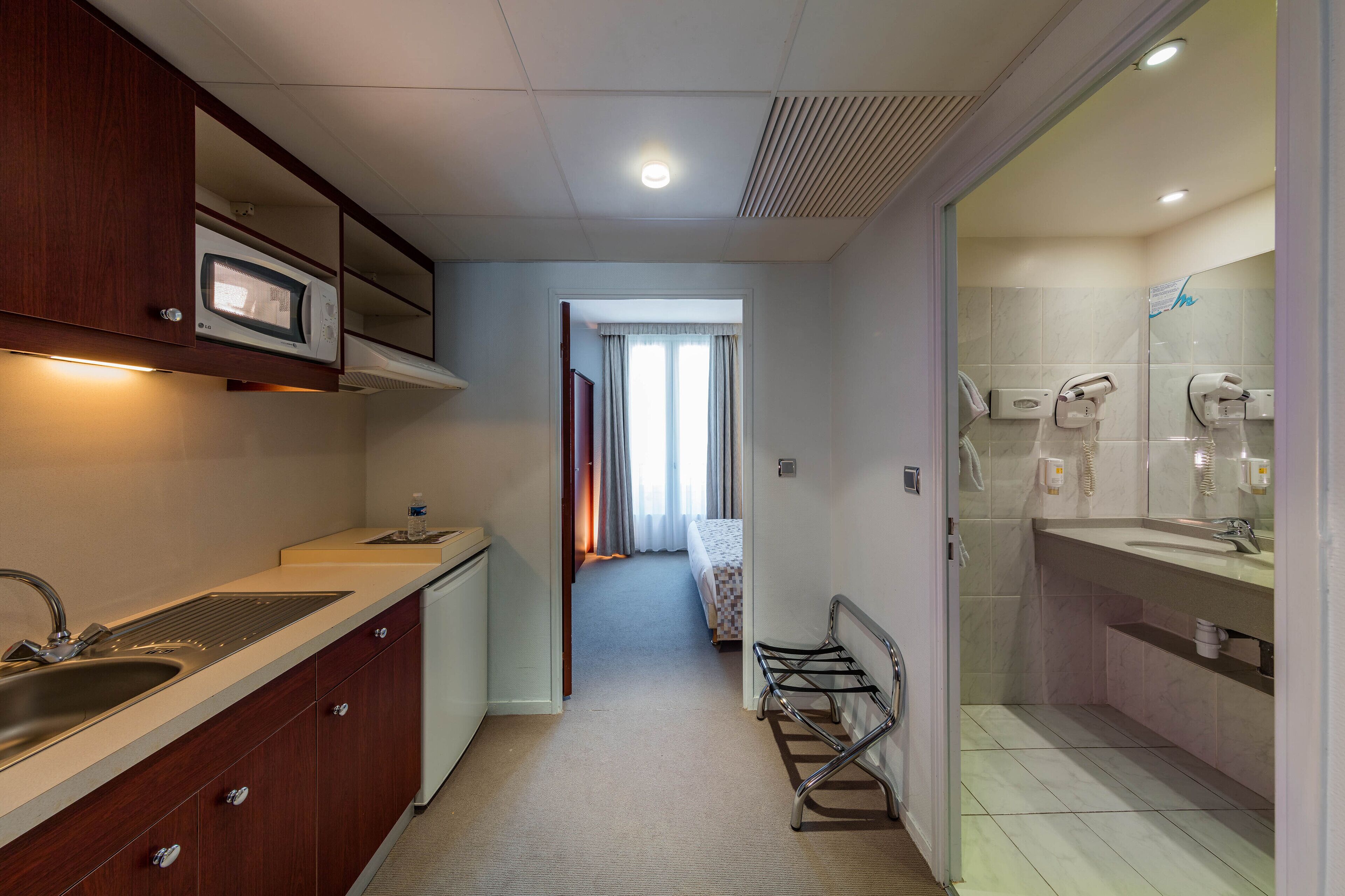 family room | premium bedding, desk, blackout curtains, iron/ironing board