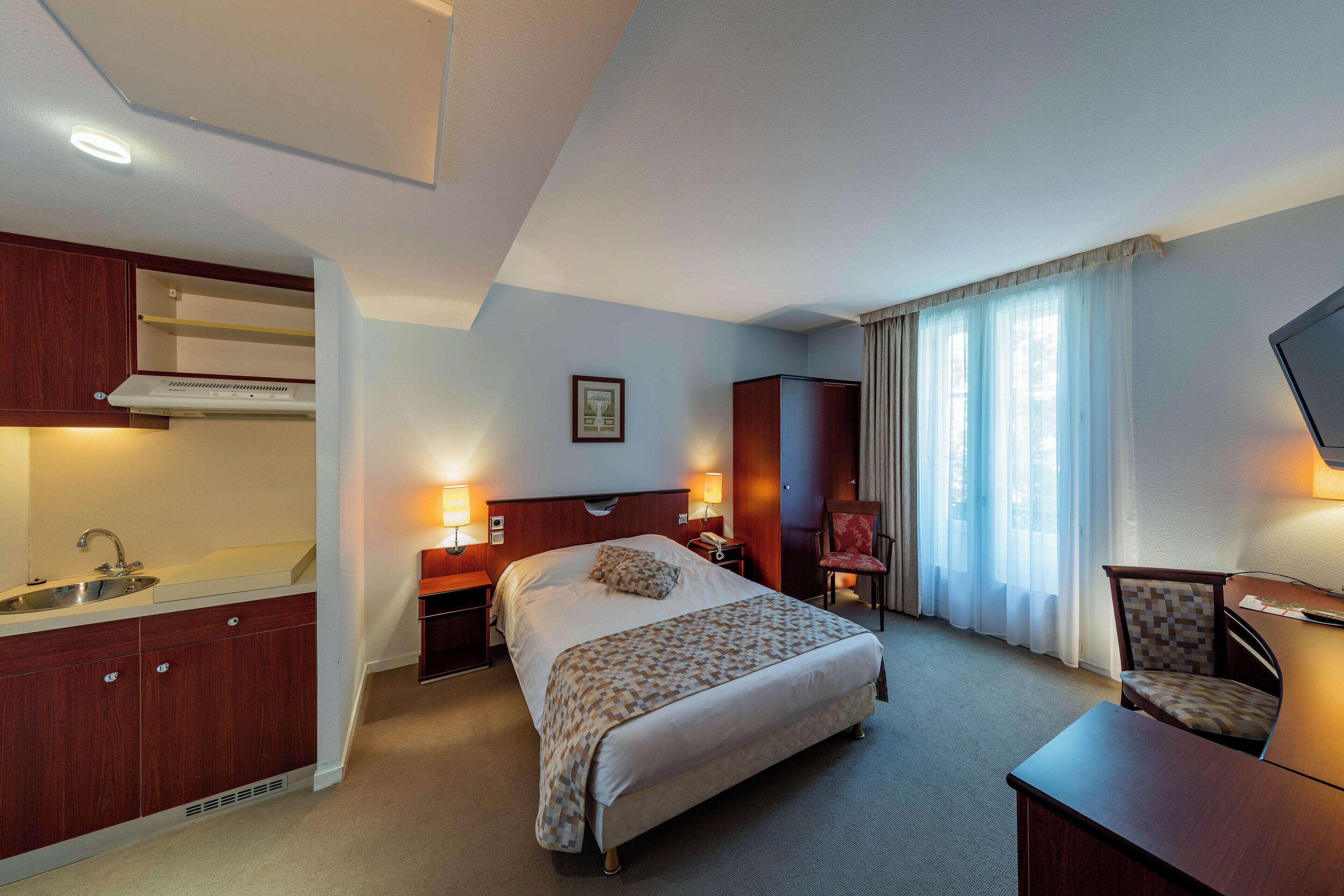 Premium bedding, desk, blackout drapes, iron/ironing board