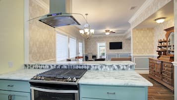 Luxury Suite, 1 King Bed, Kitchen | Private kitchen | Fridge