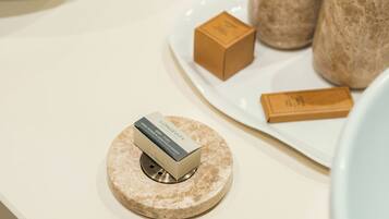 A display of products on a marble countertop.