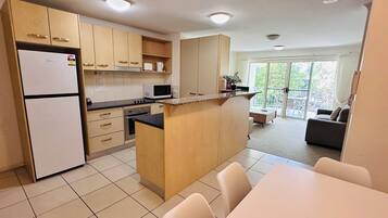 Three Bedroom Superior #1020 | Private kitchen | Fridge, microwave, electric kettle, toaster