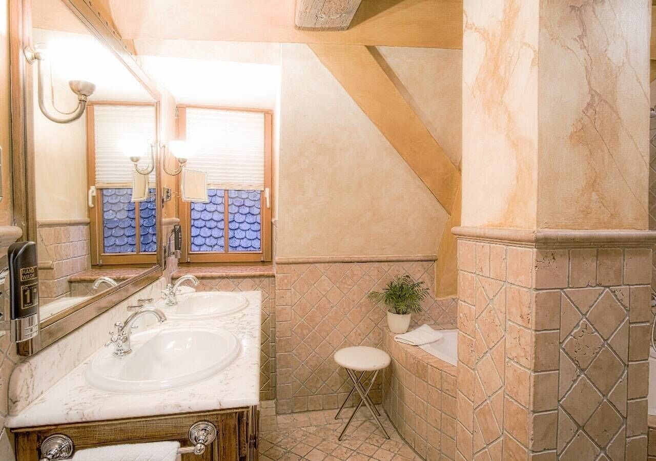 romantic double room | bathroom | hair dryer, slippers, towels