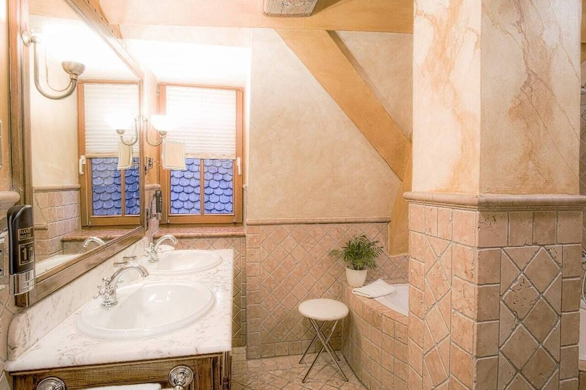 romantic double room | bathroom | hair dryer, slippers, towels