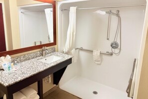 Combined shower/tub, hair dryer, towels, soap