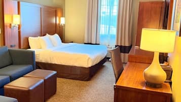 Premium bedding, desk, laptop workspace, iron/ironing board