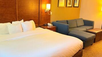 Premium bedding, desk, laptop workspace, iron/ironing board