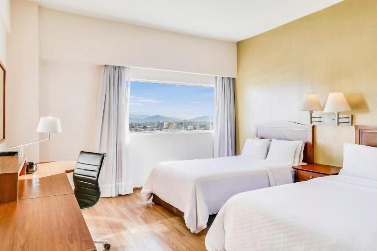 Premium bedding, in-room safe, desk, iron/ironing board